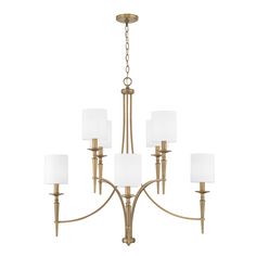 A striking combination of straight vertical lines and simple curves gives the sophisticated Abbie Chandelier its modern appeal. The lamp holders feature candlestick detailing, a nod to traditional design with a contemporary update. This versatile chandelier can be styled in two ways--with the included shades, or without them for a more minimal, monochromatic look.  Note: The 51 inch chandelier is only available in Polished Nickel. Pillar Candle Chandelier, Capital Lighting Fixture, Classic Lighting, Capital Lighting, White Chandelier, Candle Chandelier, Traditional Chandelier, Large Chandeliers, Straight Edges