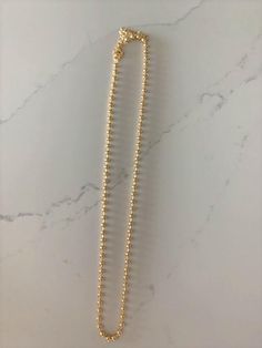 3MM Beaded Gold Filled Chain Necklace | Gold Filled | Layering Ball Gold Chain | Satellite Ball Chain| Beaded Necklace Choker | Beaded ChainHANDMADE-3MM BEADED CHAIN NECKLACE ⁙ Materials: 18K Gold filled⁙ Available Colors: Gold⁙ Measurements: 15.75"+ 2" extender or 20.25"+2" extender, 3MM BeadsHOW TO FIND YOUR PERFECT FITYour neck size is the most important measurement for determining which length will work best for you. To measure, wrap a soft tape measure around your neck, keeping the tape mea Gold Choker With Adjustable Chain And Round Beads, Gold Choker With Round Beads And Adjustable Chain, Gold Beaded Necklace With Adjustable Chain, Adjustable Beaded Chain Necklace With Round Beads, Adjustable Gold Beaded Necklace With Satellite Chain, Adjustable Ball Chain Necklace As Gift, Adjustable Ball Chain Necklace For Gift, Gold Beaded Necklace With Satellite Chain, Gold Choker With Round Beaded Chain