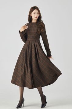 Rock the chic look with this Long Sleeve Plaid Midi Wool Dress. Stay cozy and stylish all day. 

SKU 4523 
Link in bio 

#Fashion #WinterStyle #PlaidDress #MidiDress #WoolDress #Xiaolizihandmade Fall Midi-length Tweed Dress, Winter Midi-length Tweed Dress, Winter Midi Length Tweed Dress, Formal A-line Tweed Dress For Fall, Wool Long Sleeve Midi Dress For Fall, Elegant Plaid Midi-length Dress, Fall Long Sleeve Wool Midi Dress, Fall Tweed Midi Length Dress, Wool Midi Dress With Long Sleeves For Fall