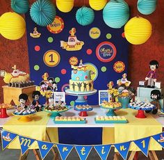 an instagram page for a birthday party with mickey mouse cake and decorations on the table