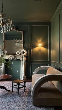 a living room filled with furniture and a chandelier