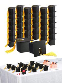 graduation party decorations with black and gold tassels