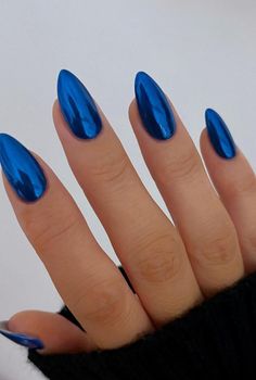 Get ready to shine bright like a diamond in 2024 with these stunning blue chrome nails! Blue Chrome Nails Almond, Royal Blue Chrome Nails, Dark Blue Chrome Nails, Cute Almond Nail Ideas, Blue Metallic Nails, Metallic Blue Nails, Blue Stiletto Nails, Stiletto Shaped Nails, Red Stiletto Nails