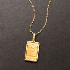 Italian 24kt Yellow Gold One-Gram Ingot Pendant Necklace with 14kt Yellow Gold Frame | Ross-Simons Classic Gold Jewelry With Rectangular Pendant, Gold Rectangular Pendant Jewelry For Formal Occasions, Classic Gold Necklace With Square Pendant, Classic Gold Necklace With Rectangular Pendant, Gold Necklace With Square Pendant And Polished Finish, Gold Necklace With Rectangular Pendant Polished Finish, Luxury Gold Rectangular Necklace, Gold Rectangular Hallmarked Necklace, Gold Rectangular Necklace