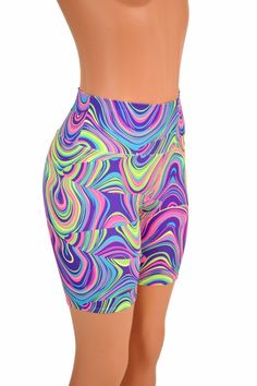 "This item is made to order, please read all the way through the listing before purchasing! Our bike shorts have a high waist, a wide, flattering, stretchy, elastic free waistband, and an 8\" inseam. Made in our black light reactive glow worm print! Womens Sizing (See below for instructions on where measurements should be taken) XXS: Bust 29\"-30\" / Waist 22\"-23\" / Hips 30\"-32\" Extra Small: Bust 31\"-32\" / Waist 24\"-25\" / Hips 33\"-35\" Small: Bust 33\"-34\" / Waist 26\"-28\" / Hips 36\" Multicolor Activewear With Built-in Shorts, Trendy Fitted High Waist Athletic Shorts, Trendy High-waisted Yoga Shorts, Multicolor Short Activewear For Spring, Trendy Fitted Multicolor Biker Shorts, Trendy Multicolor Sports Shorts, Trendy High Waist Shorts For Yoga, Multicolor Athleisure Biker Shorts For Workout, Green Fitted High-waisted Biker Shorts