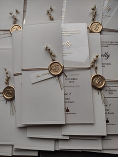 wedding stationery with wax stamp and monogrammed envelopes, tied with twine