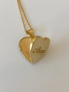 14k Gold Heart Pendant Locket For Anniversary, Vintage Personalized Gold Plated Necklace, Personalized Vintage Gold Plated Necklace, Personalized Vintage Gold-plated Necklace, Gold Heart Pendant Locket Necklace With Hallmark, 14k Yellow Gold Locket Necklace For Anniversary, Gold Locket Necklace With Hallmark For Mother's Day, Gold Locket Necklace For Mother's Day With Hallmark, Gold Heart Necklace With Hallmark