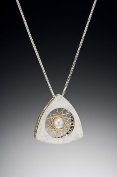 Silver & Stone Pendant - This eye-catching silver triangle pendant boasts a hand-woven, 14K yellow golden spiral pattern, adorned with a lustrous pearl. Silver box chain with lobster clasp closure. Rotating Pendant, Golden Spiral, Inspo Art, Italy Jewelry, Metal Pendants, Metal Embossing, Triangle Diamond, Talisman Jewelry, Unique Pendant Necklace