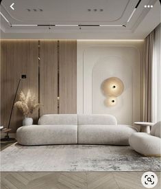 a modern living room with white furniture and wood paneling