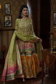 Pakistani Bridal Mehndi Gharara in Green Color with Magnificent Look emblazoned with beautiful embroidery. Buy Latest Bridal Mehndi Gharara online in USA. Mehndi Gharara, Pakistani Bridal Mehndi, Garara Sharara, Gharara Designs, Brown Clothes, Bridal Mehndi Dresses, Mehndi Dress, Shadi Dresses