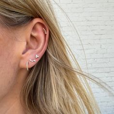 An everyday earring that can be layered on the ear or worn by itself! 14k White Gold Single Ear Cuff, Elegant Tiny 14k Gold Huggie Earrings, 14k Gold Ear Cuff With Matching Earrings, Fine Jewelry 14k Gold Ear Cuff With Matching Earrings, 14k White Gold Ear Climbers, Single Rose Gold Ear Climber In 14k Gold, Rose Gold Single Ear Climber In 14k Gold, Elegant 14k Gold Dangle Piercings, Rose Gold 14k Gold Ear Cuff