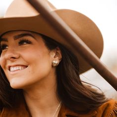 These earrings are the perfect daily cowgirl staple. The Rodeo Sweetheart post features a hand-engraved antique domed sterling hearts, with a gold-fill horseshoe taking centerstage. Show off your love for all things rodeo with these stunning, unique earrings. Western Home Decor, I Want To Be, Heart Tattoo, Hand Engraving, Unique Earrings, Rodeo, Gold Filled, Pendant, Silver