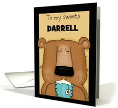 a card with an image of a brown bear holding a blue cup in it's mouth