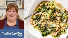 a woman in an apron is smiling next to a bowl of beans and broccoli