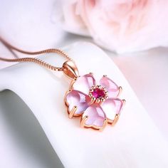 Chic Pink Opal Heart Cherry Blossom Pendant Necklace This adorable Chic Pink Opal Heart Cherry Blossom Pendant Necklace adds a touch of cuteness to any outfit. The delicate pink opal heart and cherry blossom design make it the perfect accessory for any occasion. Stand out from the crowd with this charming necklace. Cheap Pink Necklaces, Cheap Pink Necklaces For Gifts, Cute Cheap Pink Necklaces, Cheap Novelty Pink Necklaces, Cheap Hypoallergenic Pink Necklaces, Cheap Pink Necklace With Flower Charm, Affordable Kawaii Necklaces For Valentine's Day, Unique Cheap Pink Necklace, Cheap Artistic Pink Jewelry