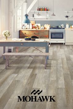 an image of a kitchen with wood floors and white appliances on the counter top in this advertisement