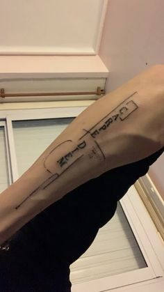 a woman with a tattoo on her arm that has a bus drawn on it and the words