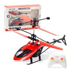 the remote controlled helicopter is red and has two blades on each side, with a controller attached