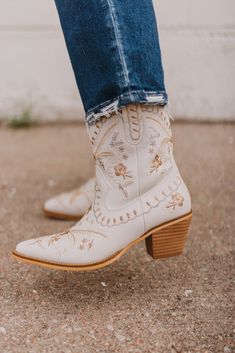 Features embroidered cowgirl boots with a chunky heel and pointed toe. -Heel Height: 2.5" Short Cowgirl Boots Outfit, Wedding Cowgirl Boots, Bridal Cowboy Boots, Western Wedding Boots, Country Wedding Boots, Embroidered Cowgirl Boots, Short Cowgirl Boots, Cowgirl Boots Wedding, Western Ideas