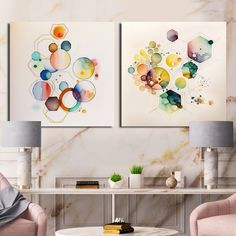 there are two paintings on the wall in this living room, one is colorful and the other is abstract