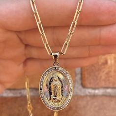 This Elegant Our Lady Of Guadalupe Necklace Features A 14k Gold-Filled Pendant, Beautifully Crafted To Honor The Virgen De Guadalupe. Perfect For Women, This Fine Fashion Jewelry Piece Combines Faith And Style, Offering A Timeless Symbol Of Devotion. Ideal For Everyday Wear Or Special Occasions, It Adds A Touch Of Elegance To Any Outfit. Description: Brand New! Won’t Tarnish Won’t Tarnish Water Resistant Hypoallergenic Nickel Free Material: 14k Gold Filled Size: 16", 18" And 20" Inches Chain Thi Lady Of Guadalupe Necklace, Outfit Description, Guadalupe Necklace, Timeless Symbol, Our Lady Of Guadalupe, Lady Of Guadalupe, Our Lady, Chain Styles, Womens Jewelry Necklace