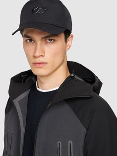 Adjustable strap at back. Front logo. SIZING:,S=S/M,M=M/L Casual Black Baseball Cap With Logo Detail, Casual Black Outerwear With Logo, Black Fitted Casual Baseball Cap, Fitted Casual Baseball Cap For Sports, Black Fitted Baseball Cap Casual, Casual Fitted Baseball Cap For Sports, Casual Nylon Winter Hat, Fitted Black Baseball Cap For Outdoor, Casual Adjustable Baseball Cap With Logo