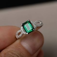 This is a gorgeous handmade creation. Its beauty is its simplicity & Elegance. The 6*8mm emerald cut lab emerald is crafted in solid sterling silver and with rhodium plated. It's made to order and it will take about 7 days to make it. All item is sent in a beautiful gift box You can realize more lovely stuff clicking the link https://www.etsy.com/shop/knightjewelry?refshopsection_shophome_leftnav Please leave the correct address and you phone number for delivering successfully. Emerald Engagement Rings, Green Engagement Rings, Vintage Emerald Engagement Ring, Rings Sterling Silver, Gold Diamond Wedding Band, Aquamarine Engagement Ring, May Birthstone, Emerald Engagement, Rings Cool