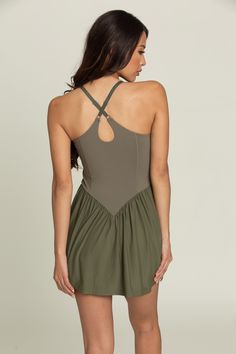 Our Olive Cross Back Corset Dress is the dress you've been dreaming about. It has everything you could ask for and more. Built in spandex shorts with hidden pockets to hold your essentials, adjustable straps and a built in bra with removable padding to give support when you need it. Throw a jacket over this dress for an evening out or put on some tennis shoes and wear it to the courts, the options are endless! Sleeveless Summer Corset Dress With Built-in Bra, Summer Activewear With Adjustable Cross-back Straps, Sleeveless Mini Dress With Built-in Bra, Spring Mini Dress With Built-in Bra And Strappy Back, Sports Mini Dress With Built-in Bra And Stretch, Tennis Skirts, Athletic Top, Spandex Shorts, Dresses Xxl