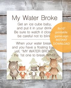 a baby shower sign with animals on it and the words,'my water broke get an ice cube baby, and put it in your drink be sure to watch it close