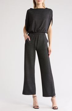 Soft, stretchy fabric offers lasting comfort in this casual jumpsuit that's framed by relaxed sleeves. Boat neck Short sleeves 47% rayon, 47% polyester, 6% spandex Machine wash, dry flat Made in the USA of imported fabric Stretch Solid Jumpsuits And Rompers With Elastic Waistband, Casual Black Jumpsuits And Rompers With Elastic Waistband, Relaxed Fit Athleisure Jumpsuits And Rompers, Stretch Solid Color Jumpsuits And Rompers For Leisure, Relaxed Fit Jumpsuits And Rompers For Athleisure, Versatile Jumpsuits And Rompers For Loungewear With Elastic Waistband, Versatile Jumpsuits And Rompers With Elastic Waistband, Stretch Jumpsuits And Rompers With Elastic Waistband, Casual Wide-leg Jumpsuit For Loungewear