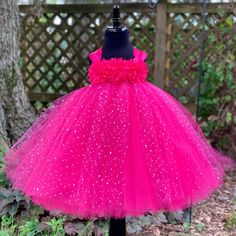 Fuzzy Duckling Design dresses ~ handcrafted for the little princess in your life. Watch your little one sparkle in this beautiful princess dress! This gorgeous dress features a stretchy, crocheted bodice that is fully lined for both comfort and modesty. The full skirts sparkle and shine with three layers of high quality tulle in matte, shimmer, and a sparkle dot finish. Satin ribbon straps and a floral bodice make this dress something extra special. This gown is perfect for birthdays, weddings, Custom Flower Girl Dress, Toddler Princess Dress, Baby Birthday Dress, Dress Sparkle, Princess Tutu Dress, Flower Princess, Fuchsia Flower, Toddler Tutu, Sparkle Skirt