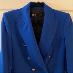 Zara Nwot Aso Princess Of Wales Kate Middleton Double Breasted Blazer Jacket In Cobalt Blue With Gold Accents. Nwot In Excellent Condition And Quality. All Hardware Is Present And Functional. Gently Tried On One Time. No Flaws To Note. The Color Is Cobalt, Royal Blue With Gold Accents. The Jacket Is Lined. The Pockets Are Decorative. The Jacket Is Double Breasted. Shoulder Pads! Approx Measurements Laid Flat: Pits: 17.5” Shoulders: 15.5” Back Center Length: 27” Waist: 15” Sleeves: 22.5” Fast Shipping. Smoke-Free Home. Reasonable Offers Accepted. Measurements Are Approximate. Luxury Blue Blazer For Fall, Designer Blue Blazer With Button Closure, Fitted Blue Double-breasted Blazer, Blue Double-breasted Long Sleeve Blazer, Luxury Blue Double-breasted Outerwear, Zara Blue Formal Outerwear, Spring Blue Double-breasted Blazer, Luxury Blue Outerwear For Spring, Designer Blue Long Sleeve Blazer