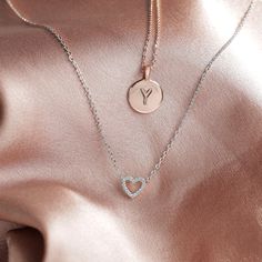 Our open heart pendant is a timeless expression of love. It’s the sweetest gift for yourself or for someone you hold close to show them just how much you care for them. With sparkling cubic zirconia and a dainty chain, this piece is perfectly flirty and feminine. 14KT yellow, rose or white gold plated AAAAA Cubic Zirconia Measurements: Diameter: 8mm (.3”) Chain length: 18”+2” extender Dainty Pendant Necklace, Dainty Choker Necklace, Dainty Necklaces, Heart Choker Necklace, Open Heart Necklace, Dainty Choker, Simple Addition, Heart Choker, Dainty Pendant