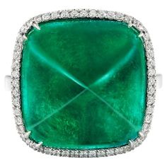 This exquisite sugarloaf cabochon emerald is surrounded by round brilliant cut pave diamond bezel The main stone has been certified by IGI Antwerp as minor oil and by GIA Round diamond 1.50 cts This ring is a size 7 but can be sized upon requesT Luxury Modern Round Emerald Ring, Biedermeier Furniture, Platinum Diamond Rings, Fine Jewels, Platinum Ring, Bezel Diamond, Gem Stone, Emerald Diamond, Cocktail Rings