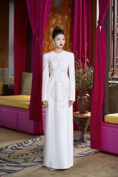 Elevate your evening wear with our Ao Dai. Crafted from luxurious velvet and satin, this floor length dress boasts a sleek, round neck design that exudes sophistication. Perfect for formal events, its sheath silhouette will flatter and enhance your figure, making you the epitome of elegance. Length: 150cm (Ao Dai), 110cm (Pants) Floor Length Dresses, Special Features, Formal Event, Neck Designs, Satin Fabric, Evening Wear, Floor Length, Sleeve Styles, Round Neck