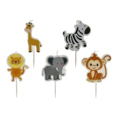 an assortment of cake toppers with animals on them