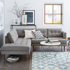 a living room filled with furniture and decor