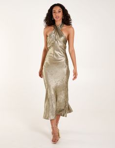 Make sure you're the best-dressed guest with this twist front halter neck gold satin slip dress. Teamed with gold heels and accessories, you can't go wrong with this little number. 100% Polyester Made in China Twist front halter neck Sleeveless Button neck Zip fastening Model wears a size: Model height: 173cm / 5ft 8 Gold Satin Slip Dress, Lame Dress, Number 100, Midi Dress Blue, Blouse Sale, Gold Satin, Gold Heels, Satin Slip, Dress 16