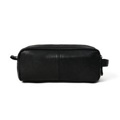 The Midnight Deluxe Toiletry Bag is an essential travel accessory for the modern man. Crafted from high-quality black leather, the sleek and compact design keep grooming essentials well-organized and secure during transportation. Specialized compartments and pockets allow for optimal storage of items, such as electric shavers, scissors, and more. The bag's leather exterior is not only stylish, but also strong and resilient, providing years of lasting use. Salient Features Color: Black Double sec Black Leather Pouch For On-the-go, Black Rectangular Pouch With Luggage Sleeve, Classic Black Travel Pouch, Functional Leather Cases For On-the-go, Functional Leather Pouch With Zipper Closure, Functional Leather Pouch With Zipper Pocket, Black Leather Pouch With Zipper Closure, Functional Leather Rectangular Pouch, Black Travel Cases With Zipper Pocket