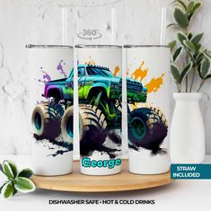 three tumblers with monster trucks painted on them