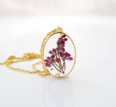 "Flower necklace / Terrarium jewelry / Mothers day gift for her / Pressed flower / Terrarium necklace / Plant jewelry Anniversary gift / gift for women / Woodland The pendant is a dainty gold plated open back bezel in an oval shape. They are so pretty, yet lightweight. The pendant measures about 1 1/3\" x 1\" oval (35mm x 25mm). A shiny silver tone 18\" snake chain is included. All jewelry items will come to you nicely packaged in a gift box. Purchase the listing below if you want to have your o Delicate Oval Pendant Necklace For Gifts, Nature-inspired Flower Pendant Jewelry For Gifts, Nature-inspired Flower Pendant Jewelry As Gift, Botanical Jewelry With Pressed Flowers, Nature-inspired Flower Jewelry For Gifts, Nature-inspired Flower Jewelry Gift, Flower-shaped Necklace With Delicate Chain As Gift For Her, Flower-shaped Necklace With Delicate Chain For Her, Flower Shaped Necklaces For Bridesmaid Gift And Mother's Day