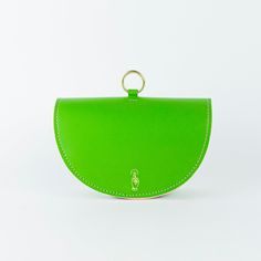 Leather belt bag. Crossbody Belt Bag For Shopping, Modern Saddle Bag With Dust Bag For Everyday, Modern Pouch With Detachable Strap And Top Handle, Modern Crossbody Saddle Bag With Dust Bag, Rectangular Leather Belt Bag For Shopping, Green Leather Travel Clutch, Green Leather Clutch For Travel, Modern Leather Wallet For Shopping, Modern Shopping Pouch