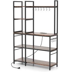 an iron and wood shelving unit with hooks on the top, two shelves below