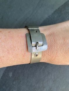 Vintage Metal Cuff Bracelet in the shape of a belt  -Cuff Style  - Metal (unknown composition)  -Can bend to fit Vintage Varsity, Metal Cuff Bracelet, Vintage Belt, Vintage Belts, Silver Cuff Bracelet, Bracelet Silver, Silver Cuff, Silver Bracelets, Vintage Metal