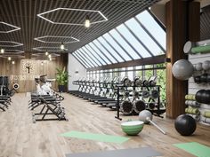 the gym is full of exercise equipment for people to work on their muscles and triceps