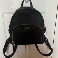 New Kate Spade Small Black Backpack Never Used Kate Spade Backpack With Adjustable Strap For Errands, Kate Spade Backpack With Zipper Closure, Kate Spade Backpack For Errands, Kate Spade School Backpack With Adjustable Strap, Kate Spade Black Backpack With Removable Pouch, Kate Spade Black Backpack With Detachable Strap, Kate Spade Black Everyday Backpack, Kate Spade Black Backpack For Errands, Trendy Kate Spade Standard Backpack