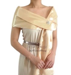 MyRadiantBeauty Silk Chiffon Wedding Wrap, Bridal Chiffon Scarf, Prom Scarf Wrap, elegant and specialty made Satin wrap Stole - Satin shawl Wrap; This wonderful Champagne satin wrap is ideal for brides, bridesmaids in weddings, prom, and formal events during warmer days. We also offer this wrap in: White, Ivory, Black, Silver Grey, Navy Blue, Champagne. For One Size: 64 in long x 17 in width --------Recommend care------- Please hand wash with cold water and steam iron only. REMARK: Brooch pin in Elegant Gold Gown For Ceremony, Beige Satin Wedding Gown, Satin Shrug, Bolero Jacket Wedding, Evening Scarf, Chiffon Jacket, Wedding Shrug, Faux Fur Wrap, Evening Shawls