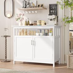 a white cabinet with lots of items on it