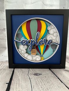 an image of a hot air balloon with the word explore in it's center