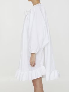 White recycled faille dress with ruffled hem. Stretch neckline with grosgrain drawstring and balloon sleeves with stretch cuffs. The model is 180cm tall and wears size 36.Size nationality: FR Product number: 4755680 Product code: DR1080017001W Composition: 100% cotton Billowy Peasant Dress With Gathered Sleeves For Daywear, Billowy Puff Sleeve Dress With Ruffles For Daywear, Billowy Smocked Cuffs Dresses For Daywear, Bishop Sleeve Midi Dress With Ruffles For Daywear, Voluminous Long Sleeve Dresses For Daywear, Long Sleeve Puff Sleeve Dress With Ruffles For Daywear, Long Sleeve Ruffled Dress With Voluminous Skirt, Billowy Bishop Sleeve Dress With Ruffles, Long Sleeve Dresses With Ruffles And Voluminous Skirt